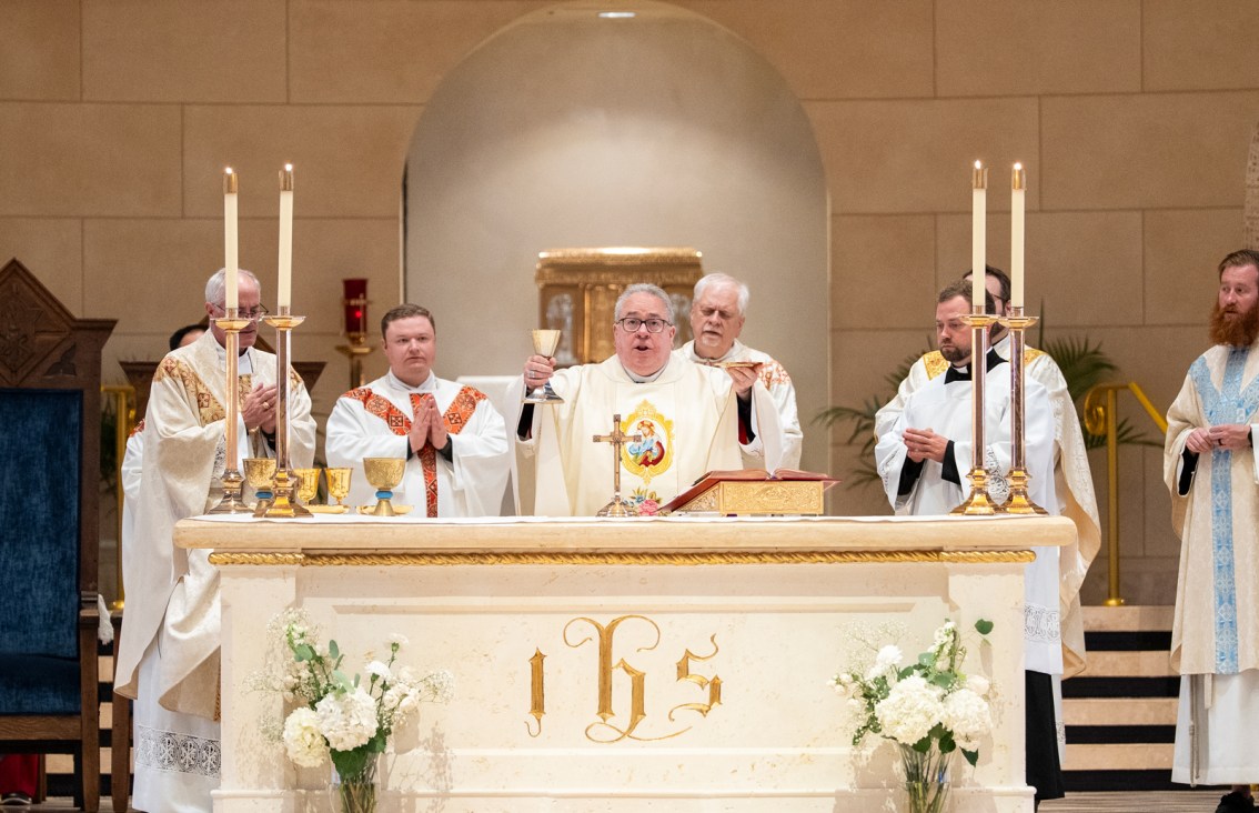 Bishop Olson at altar