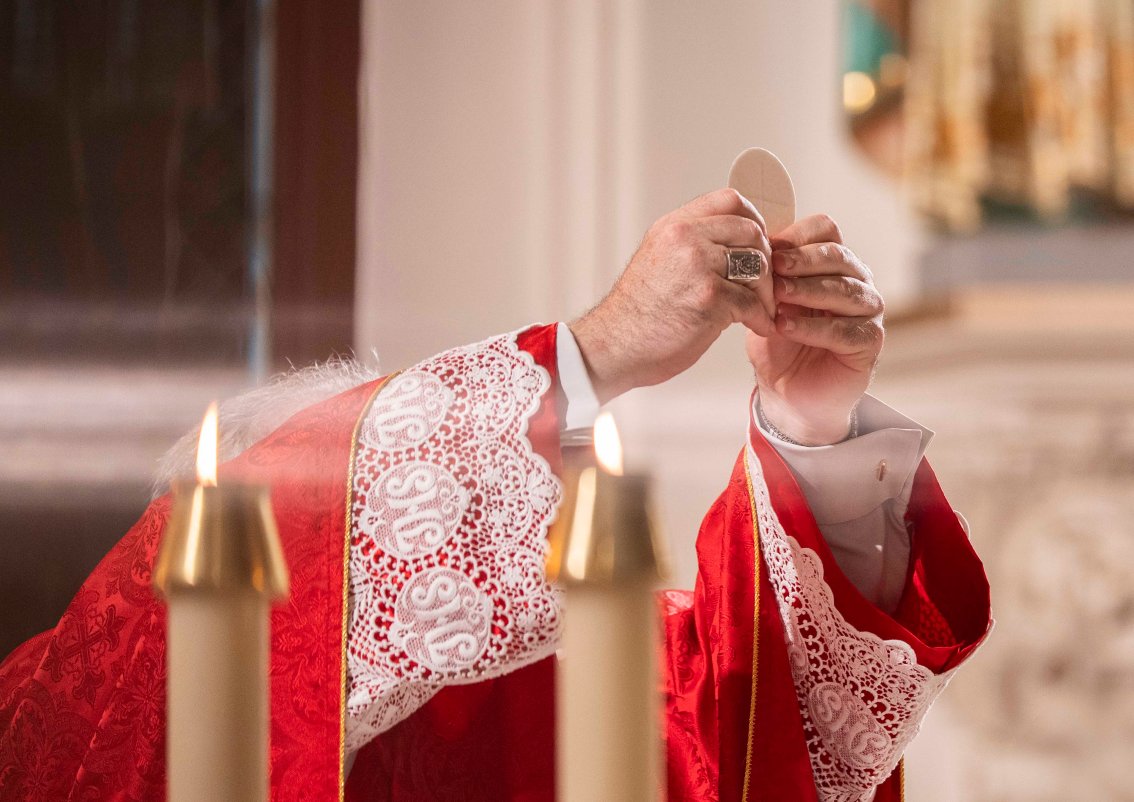 Red sleeves and Eucharist